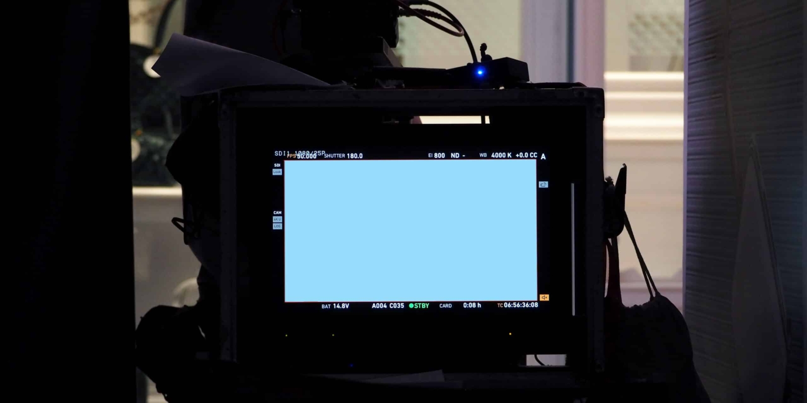 Behind video production digital view screen monitor from movie shooting camera in the studio.